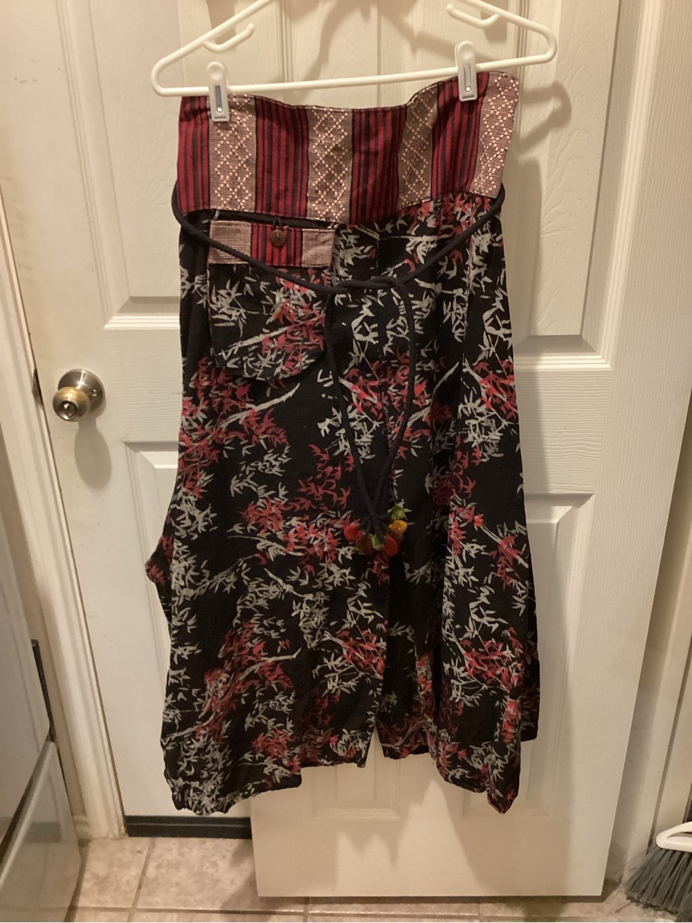 Black Floral Wide-Leg Jumpsuit with Red Accents
